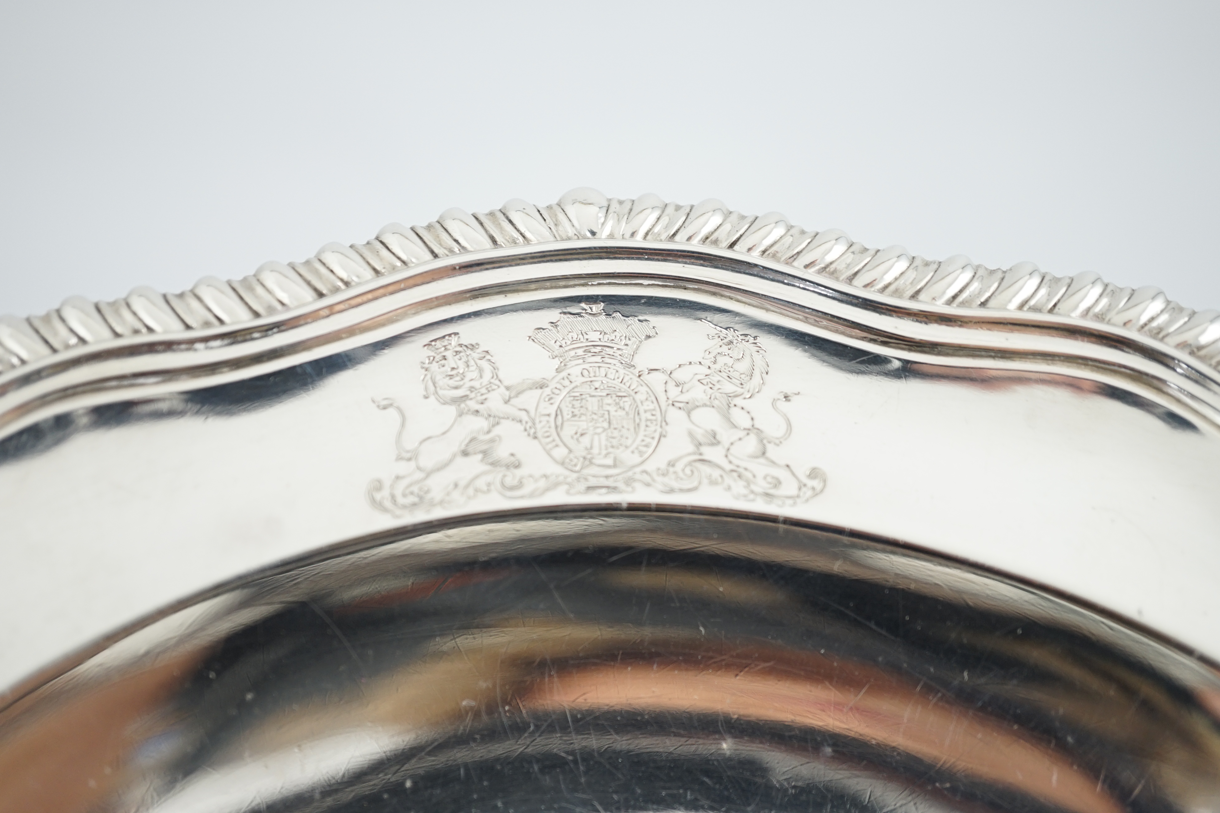 A George IV silver soup plate, by William Eaton